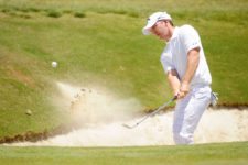 BUENOS AIRES, ARGENTINA - DEC. 5, 2013: Ryan Blaum of the United States hits from a bunker on the 7th hole during the first round of the 108th VISA Open de Argentina presented by Peugeot at Nordelta Golf Club. / Ryan Blaum de Estados Unidos pega desde un búnker en el hoyo 7 durante la primera ronda del 108° VISA Open de Argentina presentado por Peugeot at Nordelta Golf Club.