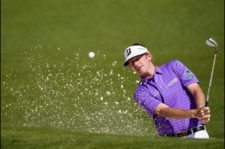 Hass adelante por uno luego de la 1ra ronda (cortesía Harry How, David Cannon, Rob Carr & Andrew Redington / Getty Images)