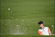 Hass adelante por uno luego de la 1ra ronda (cortesía Harry How, David Cannon, Rob Carr & Andrew Redington / Getty Images)