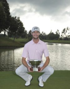 BOGOTA, COLOMBIA - OCTOBER 5: Nicholas Lindheim the Arturo Calle Colombian Classic trophy following his one stroke victory on the 18th hole green during the final round of the Arturo Calle Colombian Classic Presentado por Avianca at Pueblo Viejo Country Club on October 5, 2014 in Bogota, Colombia. (Enrique Berardi/PGA TOUR)