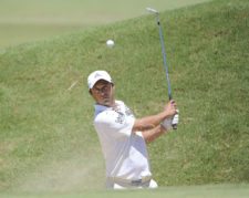 BUENOS AIRES, ARGENTINA - DECEMBER 5: Rafael Echenique of Argentina chips out of a bunker on the 14th hole during the second round of the 109° VISA Open de Argentina presentado por Peugeot at Martindale Country Club on December 5, 2014 in Buenos Aires, Argentina. (Enrique Berardi/PGA TOUR)