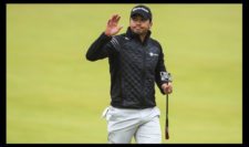 Jason Day of Australia acknowledges the crowd from the 18th green during the third round of the 144th Open Championship at The Old Course on July 19, 2015 in St Andrews, Scotland (Photo by Andrew Redington-Getty Images)