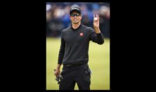 Adam Scott of Australia reacts on the 18th hole during the third round (Photo by Stuart Franklin-Getty Images)