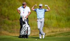 Jamie Donaldson of Wales waits in a fairway with his caddie during a practice round prior to the 2015 PGA Championship at Whistling Straits on August 12, 2015 in Sheboygan, Wisconsin (Photo by Kevin C. Cox/Getty Images)