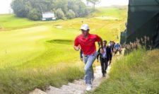 Rory McIlroy of Northern Ireland walks up a set of stairs after a practice round prior to the 2015 PGA Championship at Whistling Straits on August 10, 2015 in Sheboygan, Wisconsin (Photo by Andrew Redington/Getty Images)