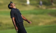 Tiger Woods of the United States reacts to a shot during a practice round prior to the 2015 PGA Championship at Whistling Straits on August 12, 2015 in Sheboygan, Wisconsin (Photo by Andrew Redington/Getty Images)