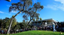 Crowds gather as Rory McIlroy hits his tee shot at the par-4 tenth Friday at the Frys.com Open (Cliff Hawkins/Getty Images)